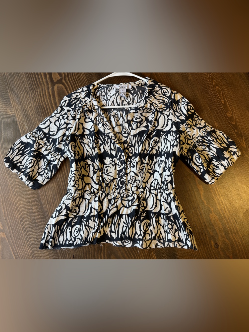 Vertigo Paris Black and White Floral Button-Front Peplum Top